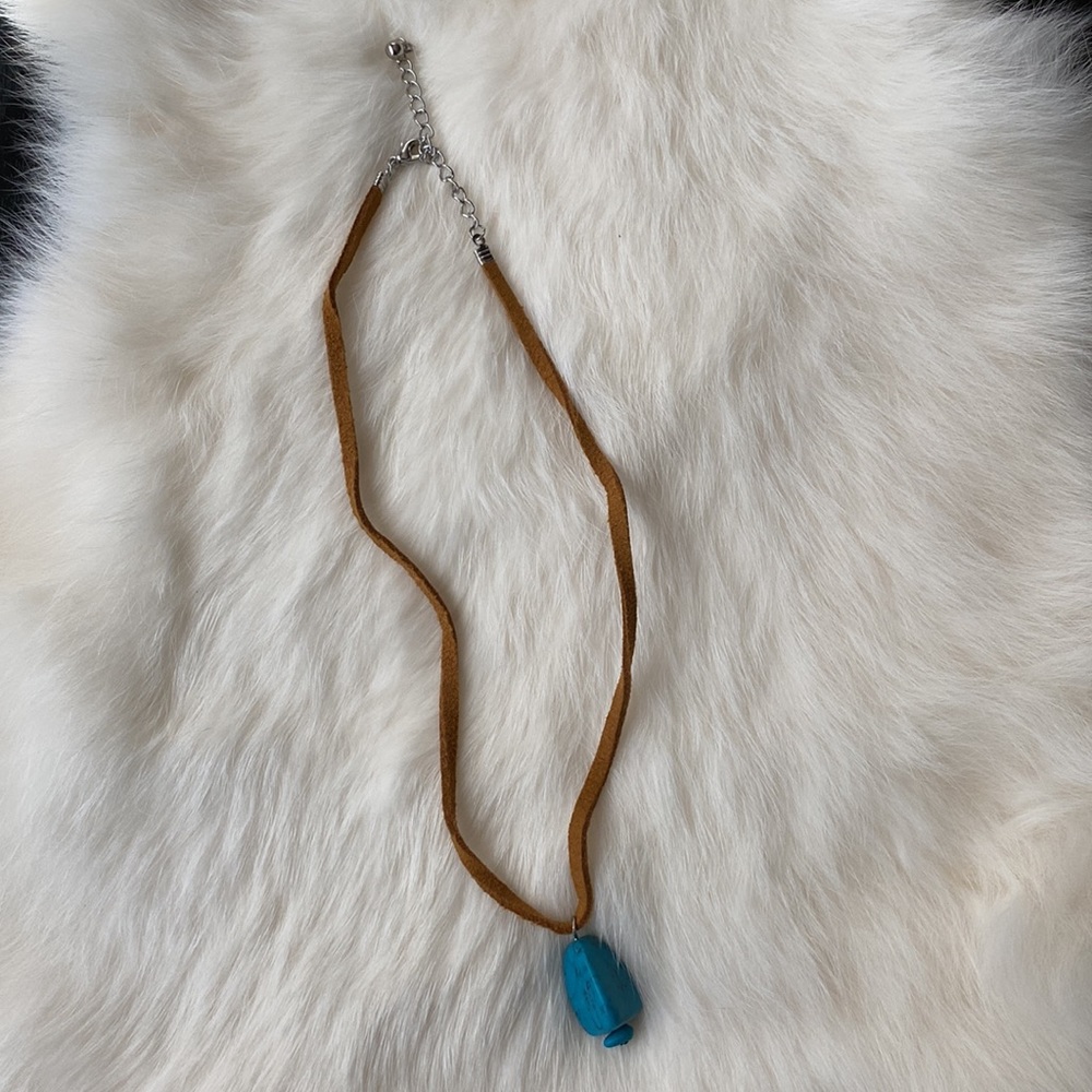 Turquoise stone with leather cord necklace